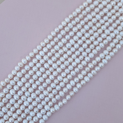 Перли натуральні, білі, плоско-округлі, 5-6 мм., АА+, нитка ... Перли натуральні, білі, плоско-округлі, 5-6 мм., АА+, нитка ...