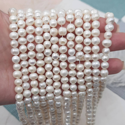 Перли натуральні, 7-8 мм., білий, овальний, нитка 35 см.