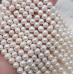 Перли натуральні, 7-8 мм., білий, овальний, нитка 35 см.