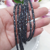 Намистини з перламутру натурального 3х4 мм., шайби, чорні, нитка 38 см. Намистини з перламутру натурального 3х4 мм., шайби, чорні, нитка 38 см.