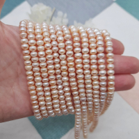 Перли натуральні, рожеві, плоско-округлі, 6-7 мм., АА+, нитка 36 см.
