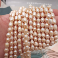 Жемчуг натуральный, персиковый, овальный (рис), 7-8 мм., АА+, нить 35 см. Жемчуг натуральный, персиковый, овальный (рис), 7-8 мм., АА+, нить 35 см.