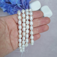 Перли натуральні, білі, овальні (рис), 7-8 мм., АА+, нитка 35 см.