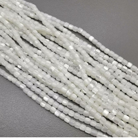 Намистини з перламутру натурального 2х4 мм., шайби, білі, нитка 38 см.